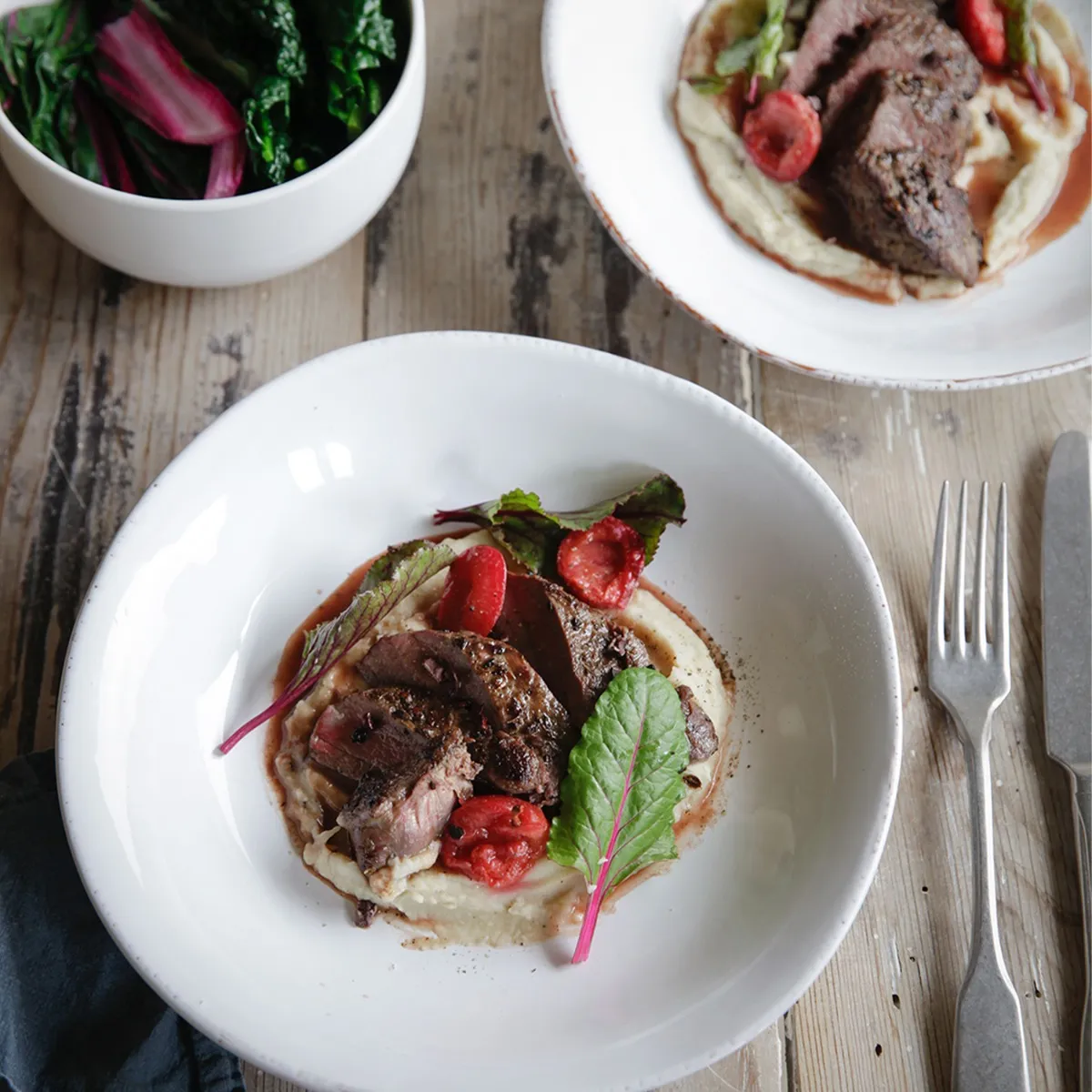 Loin of Venison With Celeriac Pure?e & Baked Plums 